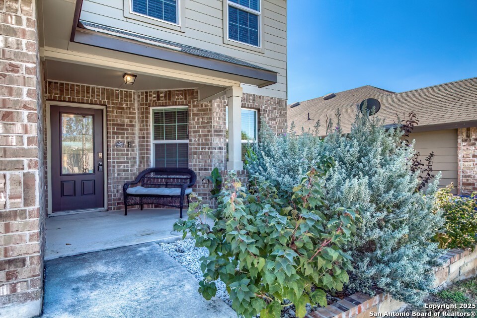 7006 Quantum Loop San Antonio, TX 78252 - Photo 3 of 37 a view of a house with a bench and a porch