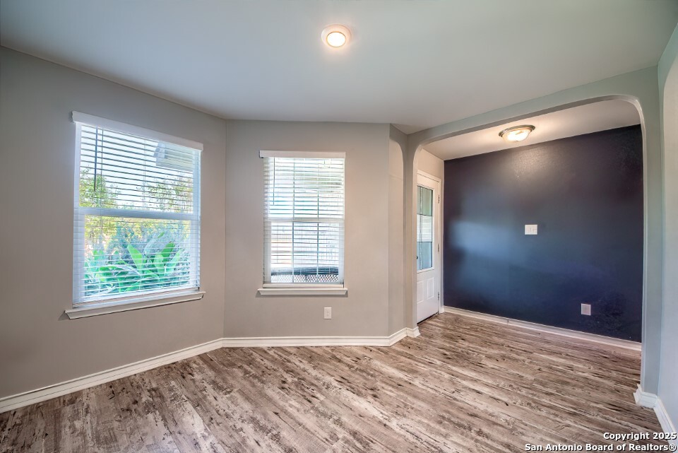 7006 Quantum Loop San Antonio, TX 78252 - Photo 6 of 37 a view of empty room with window and ceiling fan