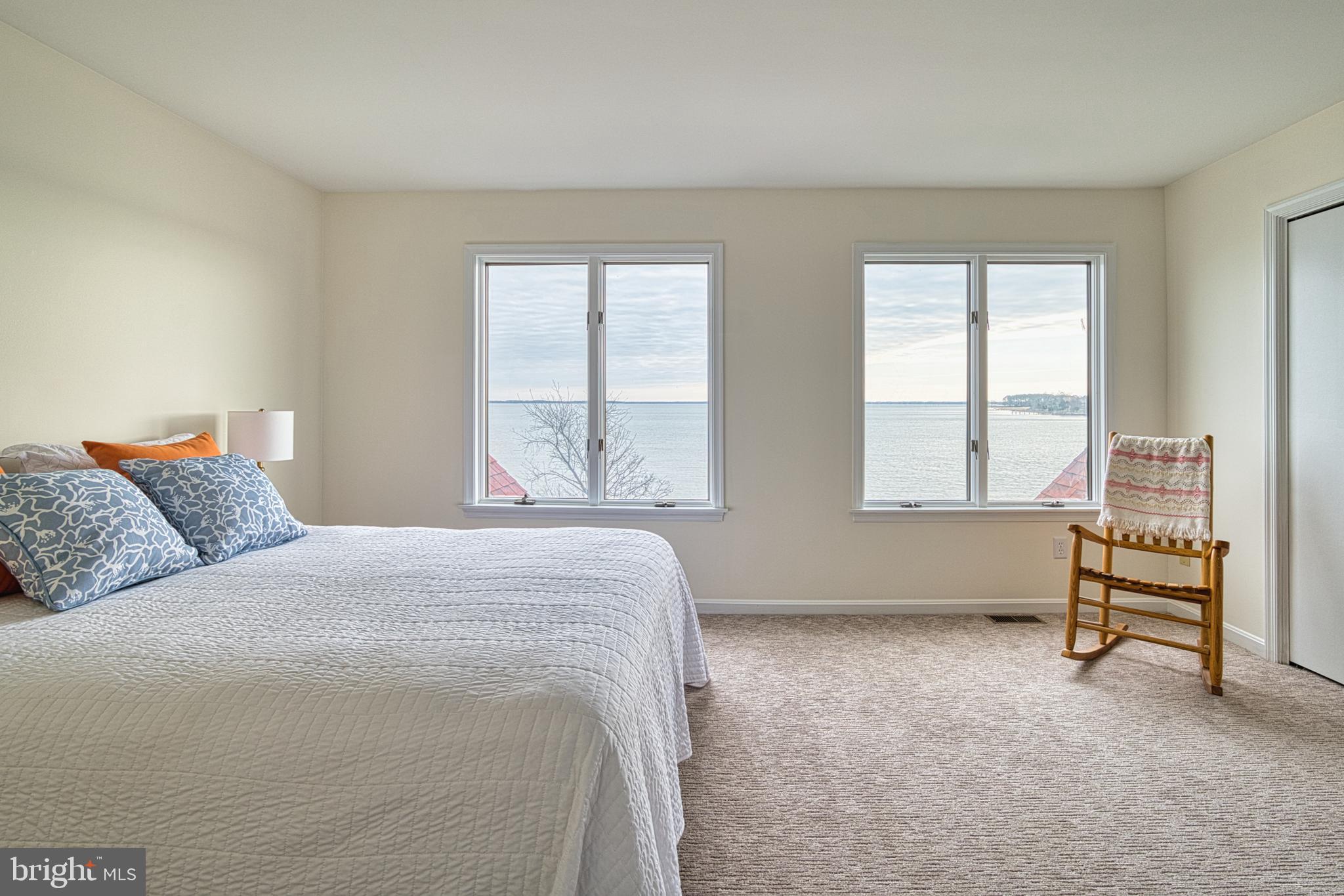 34 Queen Anne Way Chester, MD 21619 - Photo 12 of 52 a bedroom with a bed and a window