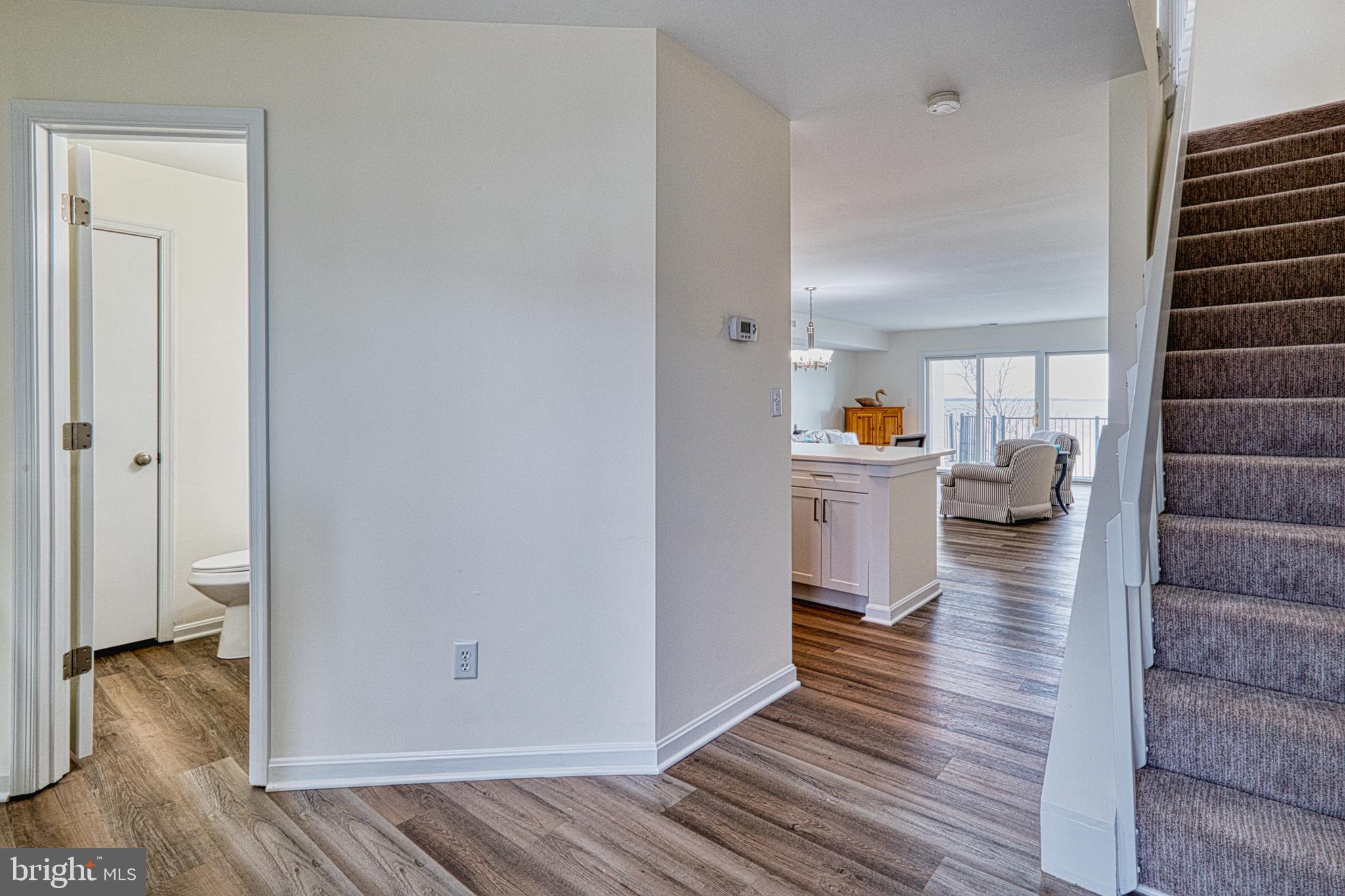 34 Queen Anne Way Chester, MD 21619 - Photo 13 of 52 a view of a living room and hardwood floor