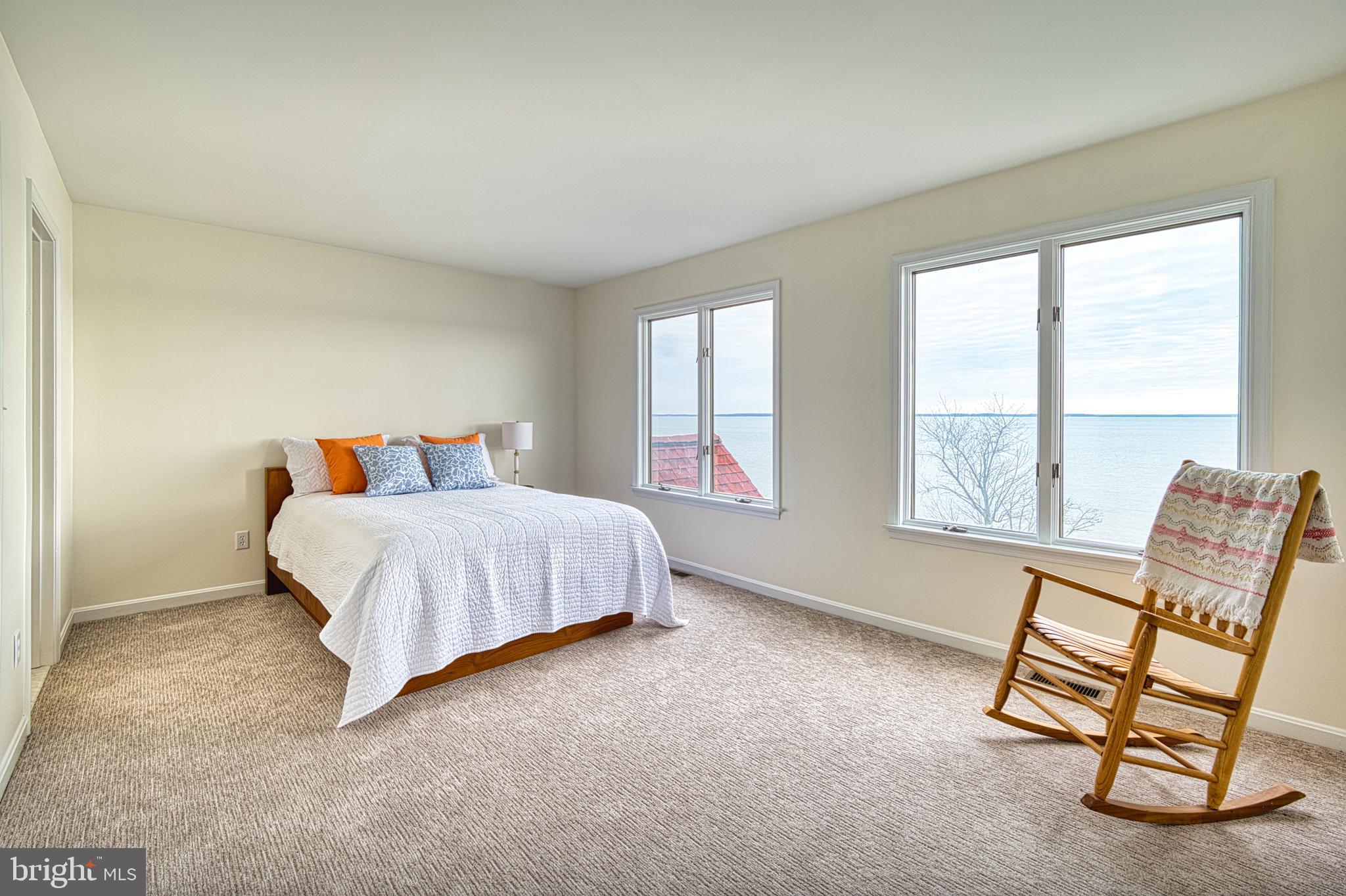 34 Queen Anne Way Chester, MD 21619 - Photo 15 of 52 a bedroom with a bed and a window
