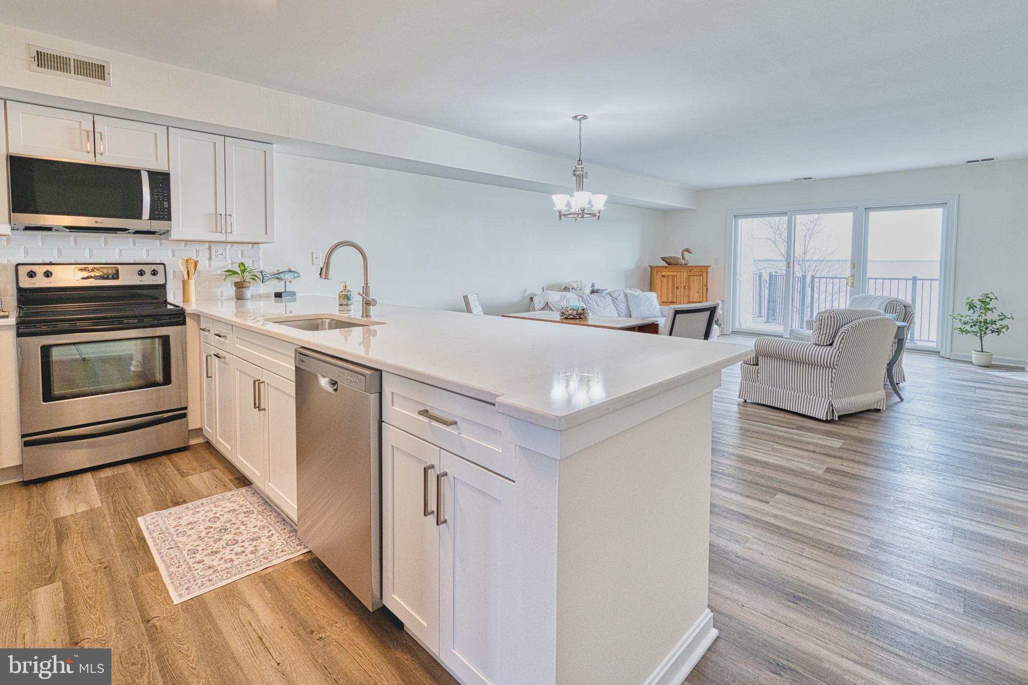34 Queen Anne Way Chester, MD 21619 - Photo 4 of 52 a view of living room with furniture and flat screen tv
