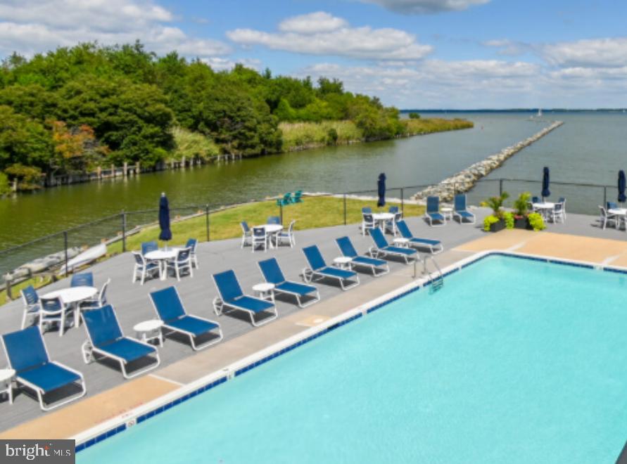 34 Queen Anne Way Chester, MD 21619 - Photo 42 of 52 a view of a lake with couches and chairs