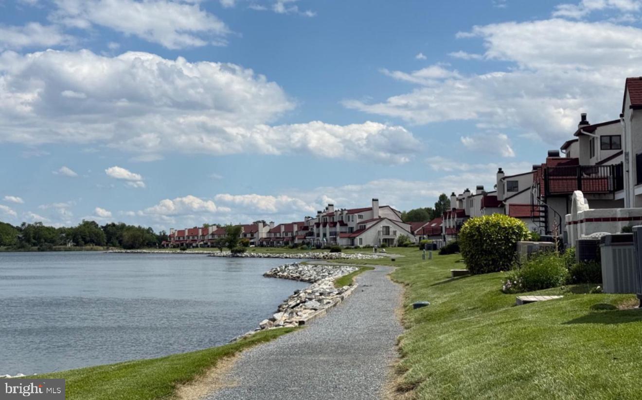 34 Queen Anne Way Chester, MD 21619 - Photo 52 of 52 a view of a lake with houses in the back