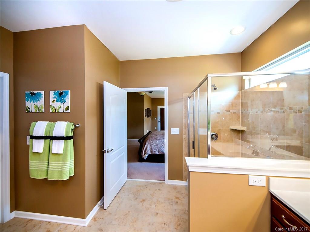 4242 Perth Road Indian Land, SC 29707 - Photo 16 of 24 a en suite bathroom with a sink and mirror