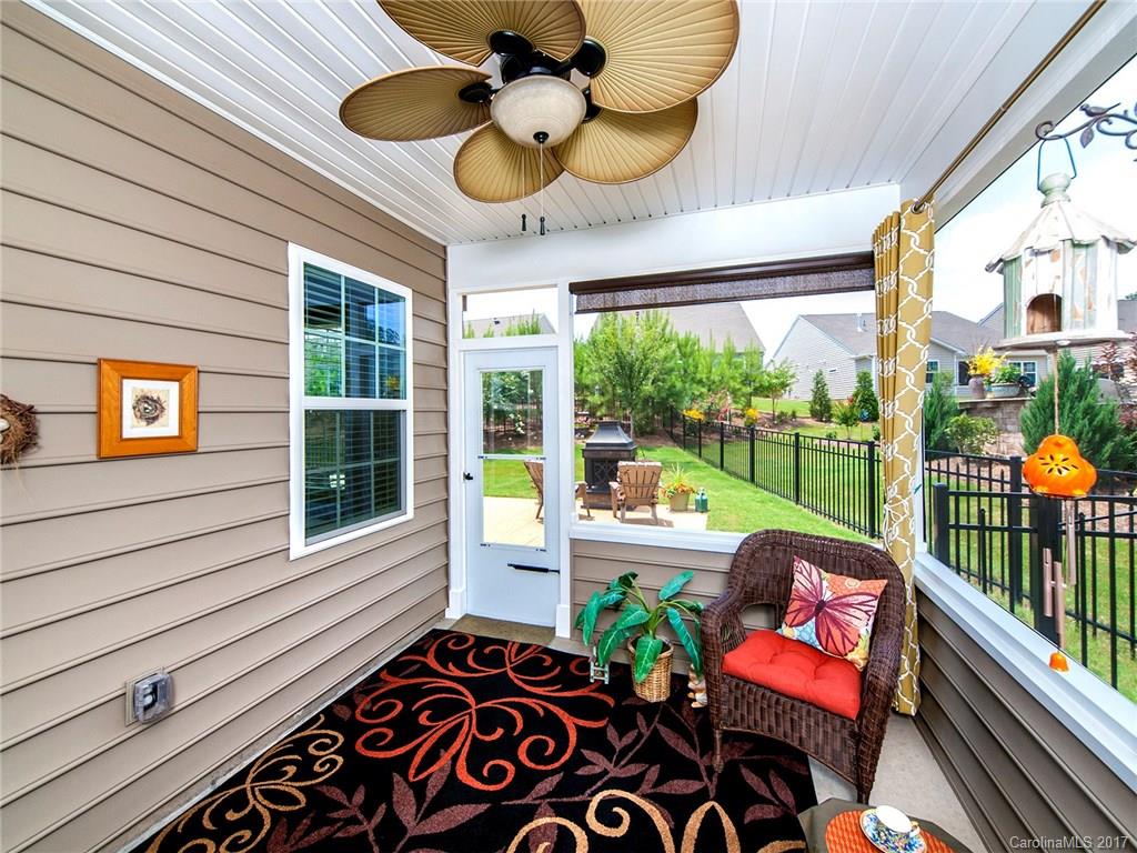 4242 Perth Road Indian Land, SC 29707 - Photo 21 of 24 a view of a porch with furniture and a yard