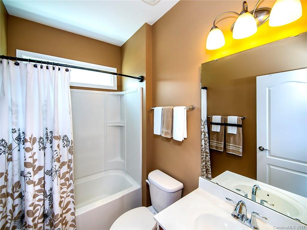 4242 Perth Road Indian Land, SC 29707 - Photo 4 of 24 a bathroom with a sink toilet and shower