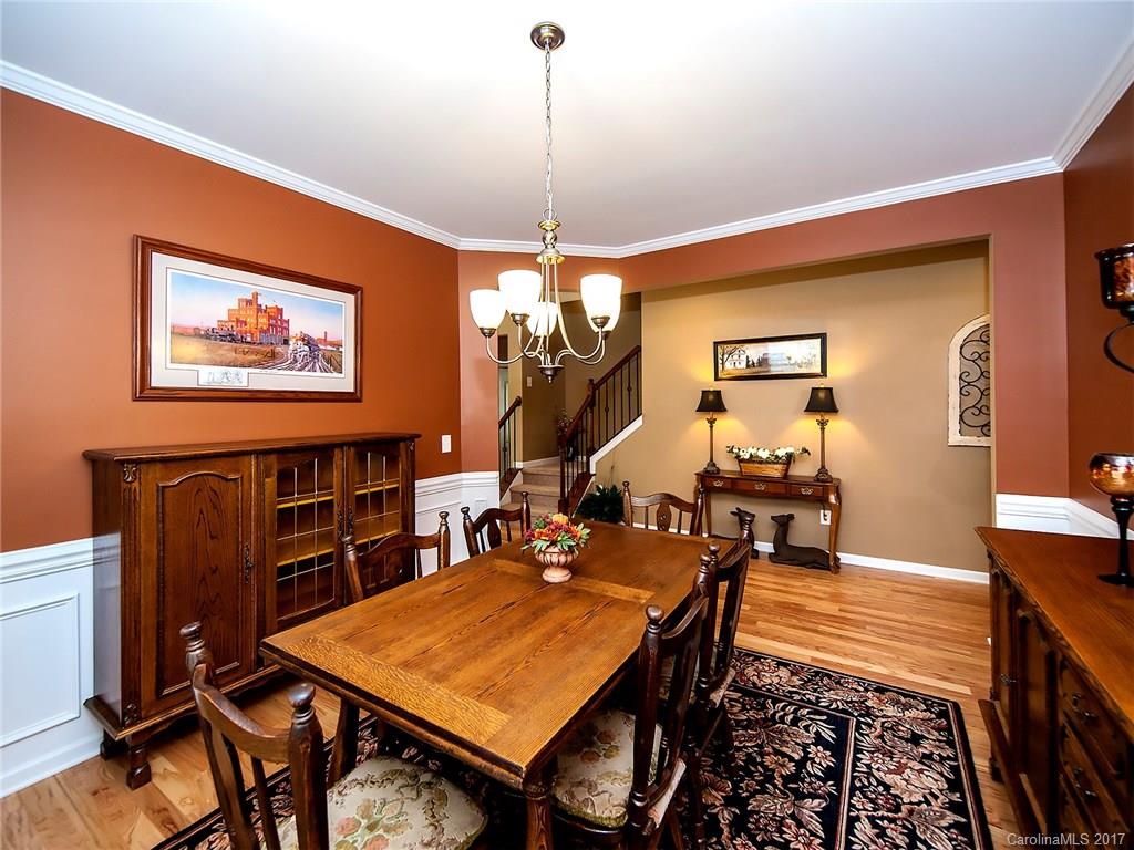 4242 Perth Road Indian Land, SC 29707 - Photo 7 of 24 a view of a dining room with furniture window and wooden floor