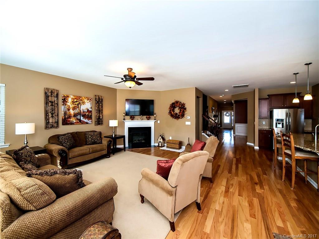 4242 Perth Road Indian Land, SC 29707 - Photo 9 of 24 a living room with furniture and a fireplace