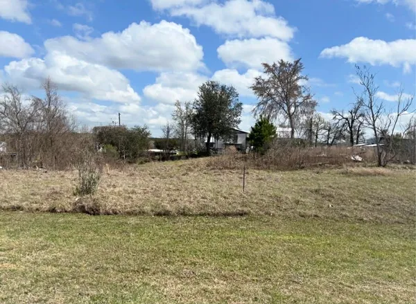 a view of yard covered with snow