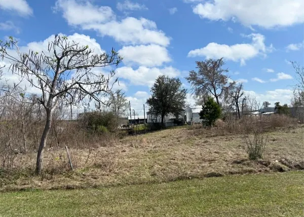 a view of a yard covered with snow