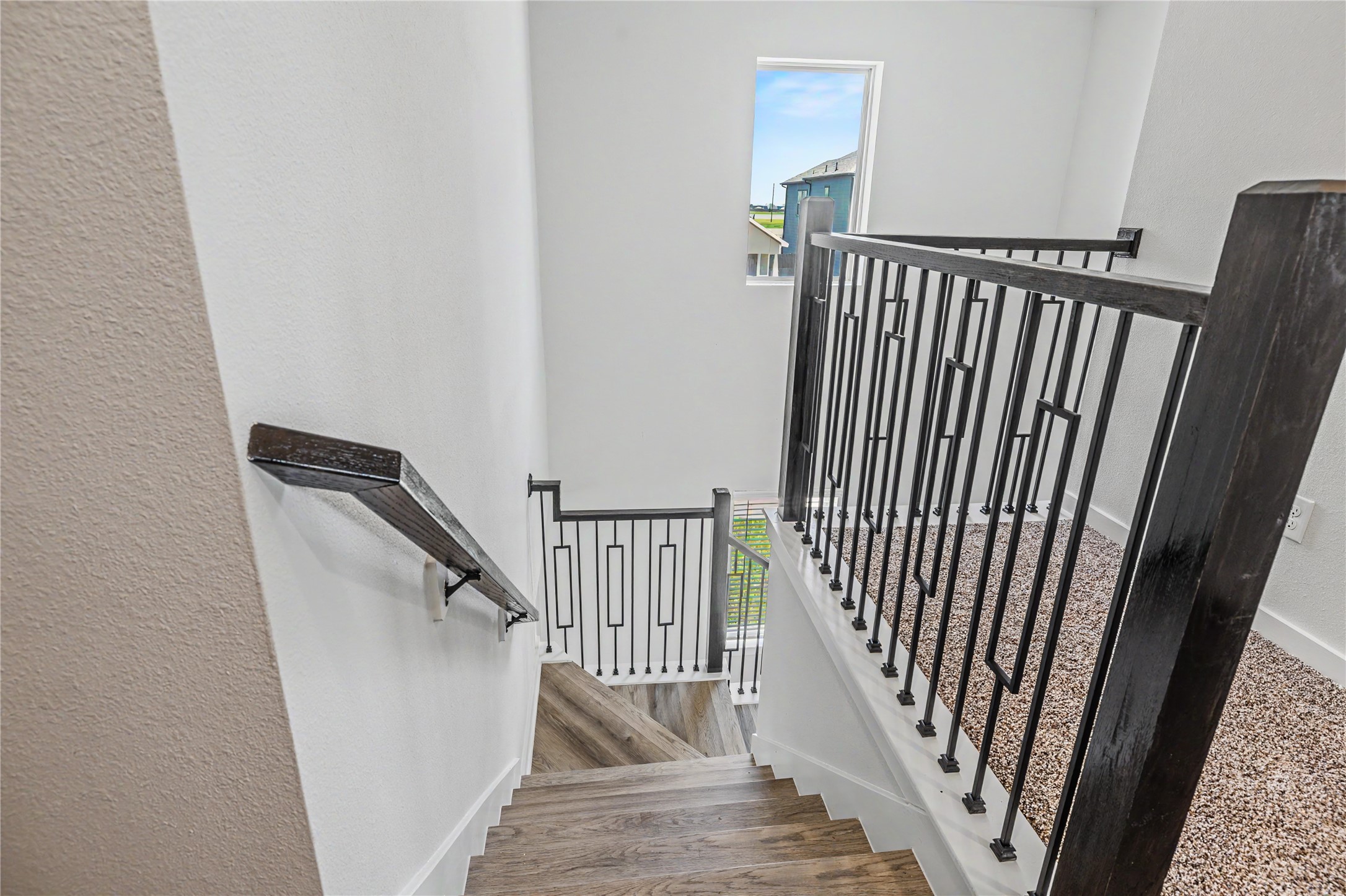 6427 Bolinas Court Rosharon, TX 77583 - Photo 19 of 49 a view of staircase with railing and white walls