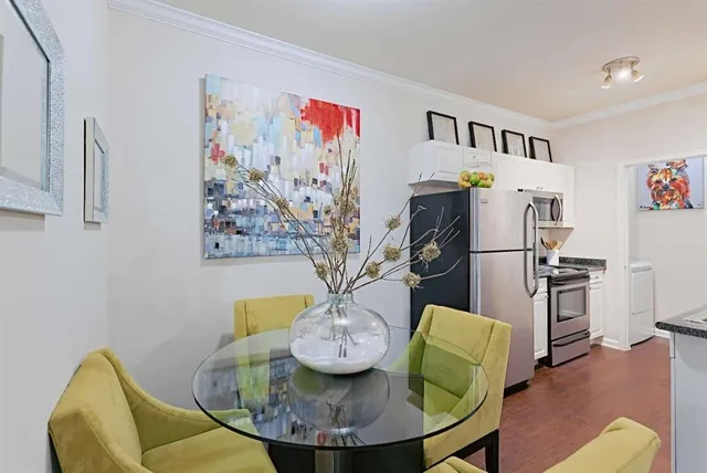 a view of a dining room with furniture