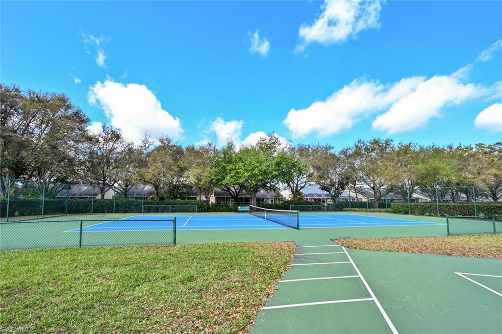 8260 Laurel Lakes Boulevard Naples, FL 34119 - Photo 38 of 41 a view of a tennis court