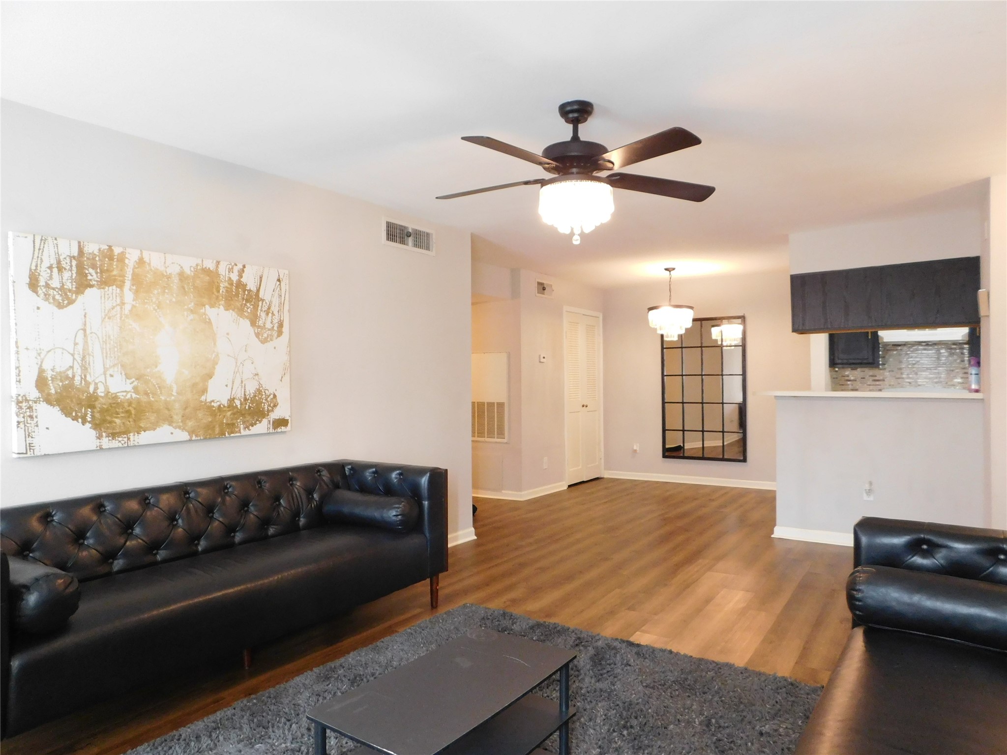 10101 South Gessner Road, Unit 912 Houston, TX 77071 - Photo 2 of 47 a living room with furniture and a large window