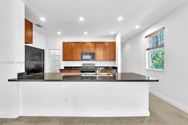 a view of empty room with windows
