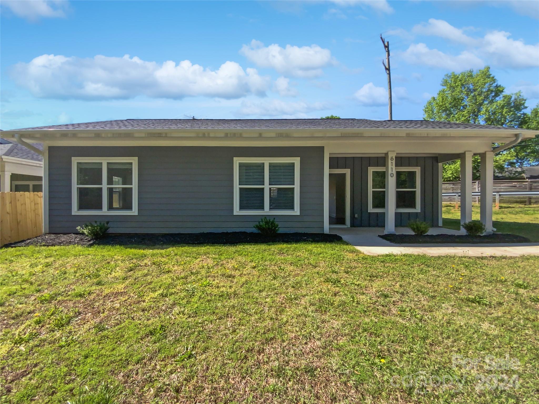 6110 Robinson Church Road Charlotte, NC 28215 - Photo 1 of 17 front view of a house with a yard