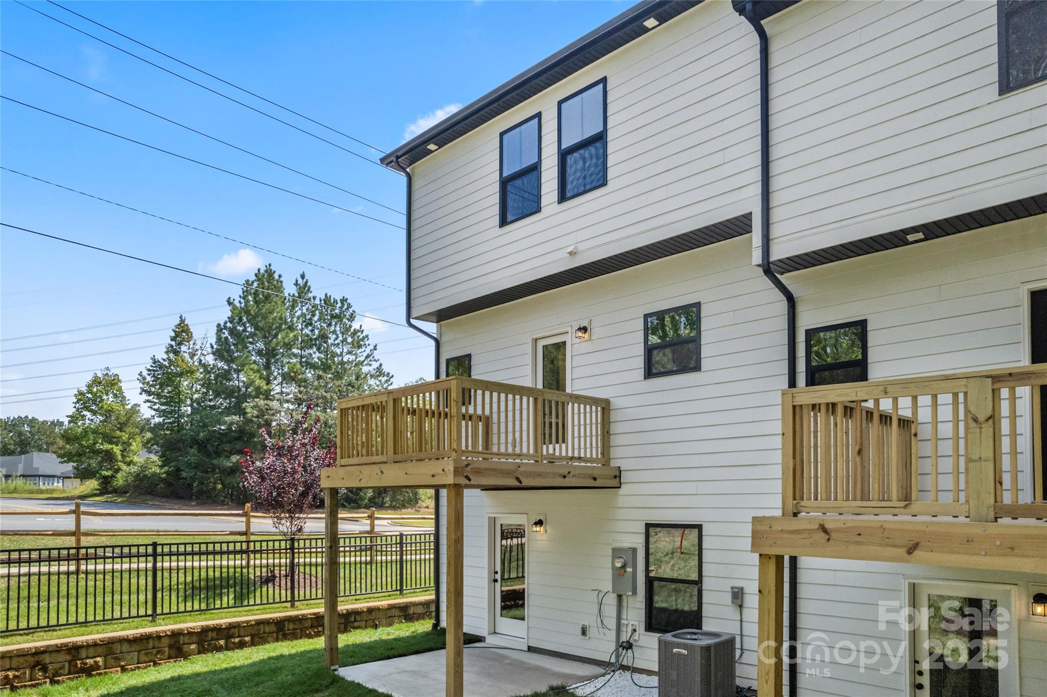 418 Bogue Drive, Unit 21 Fort Mill, SC 29708 - Photo 31 of 42 a view of a house with a backyard