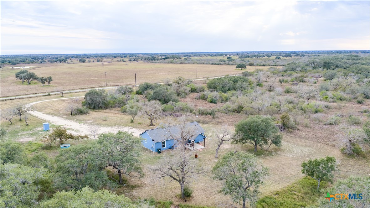 618 McGuill Road Goliad, TX 77963 - Photo 1 of 48 a view of a lake and mountain