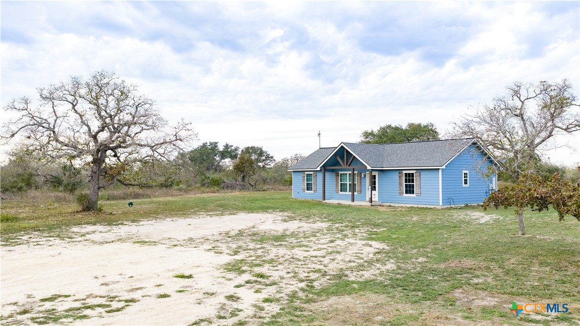 618 McGuill Road Goliad, TX 77963 - Photo 13 of 48 a view of a house with a yard