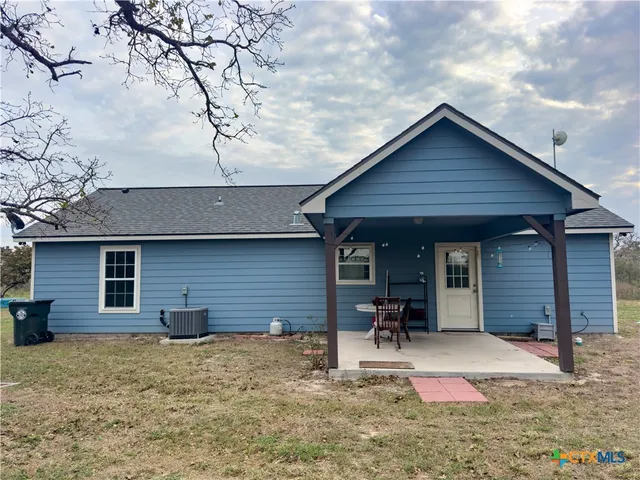 a house view with a outdoor space
