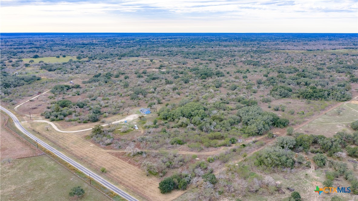 618 McGuill Road Goliad, TX 77963 - Photo 24 of 48 a view of an ocean beach and mountain