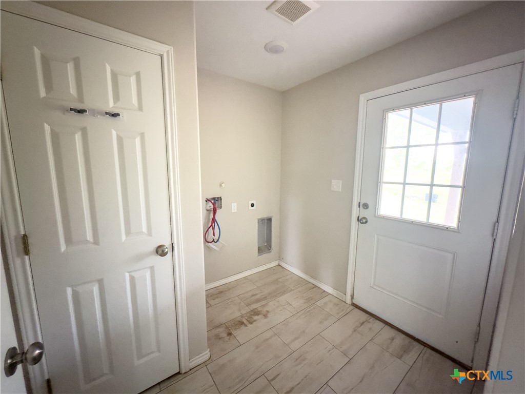 618 McGuill Road Goliad, TX 77963 - Photo 48 of 48 an empty room with windows