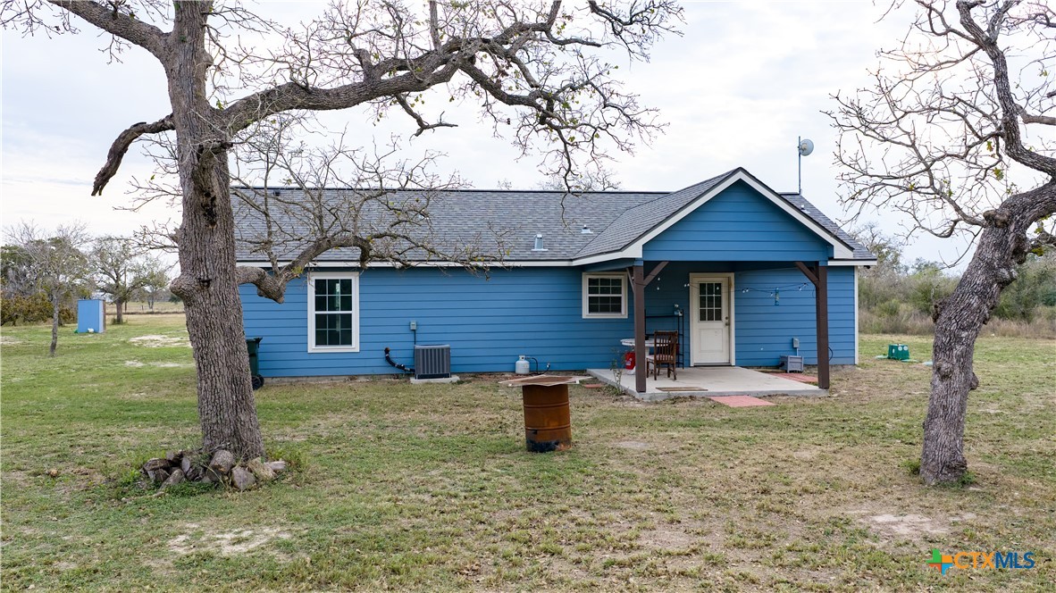 618 McGuill Road Goliad, TX 77963 - Photo 5 of 48 a front view of a house with garden