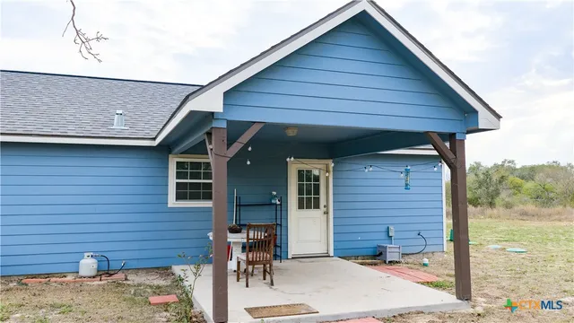 a brick house with a large window