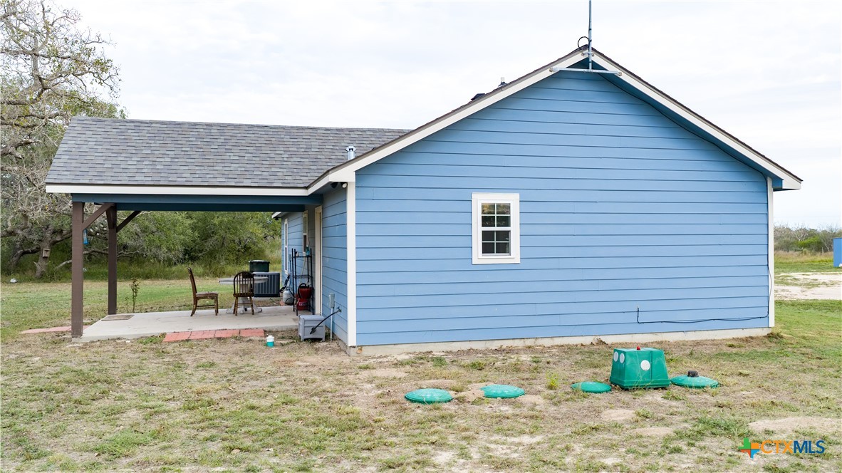 618 McGuill Road Goliad, TX 77963 - Photo 7 of 48 a backyard of a house with outdoor seating