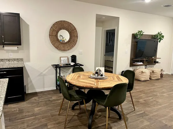 a view of a dining room with furniture