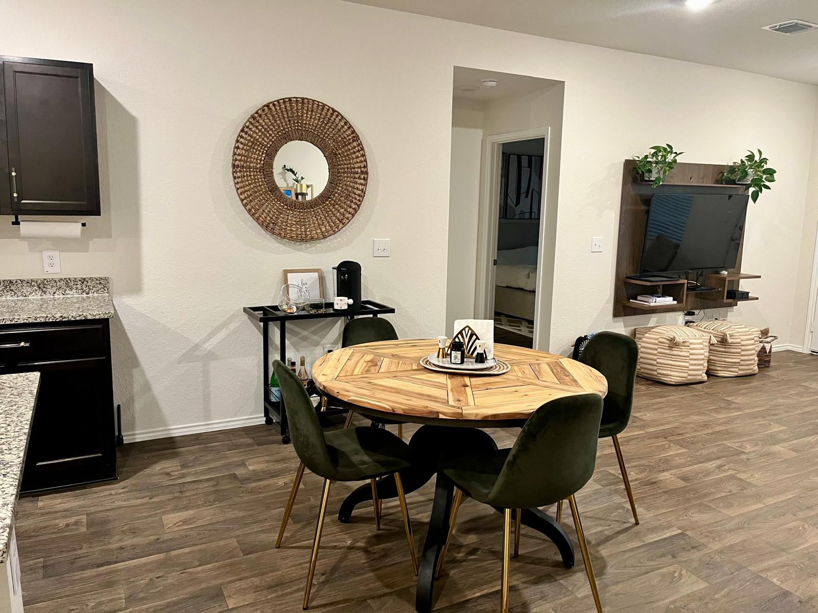 15006 Breccia Road Manor, TX 78653 - Photo 3 of 8 a view of a dining room with furniture