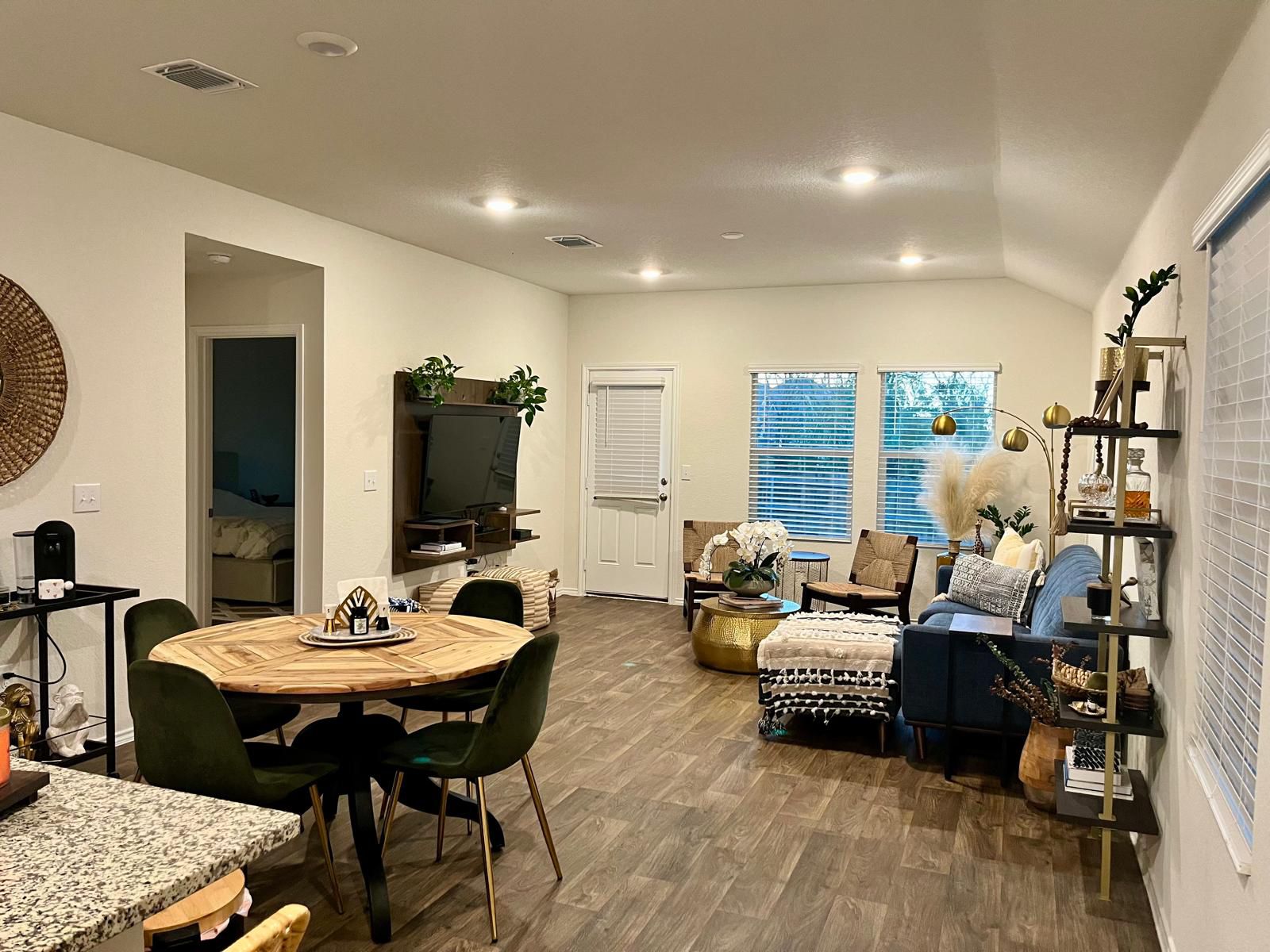 15006 Breccia Road Manor, TX 78653 - Photo 4 of 8 a living room with furniture and a large window