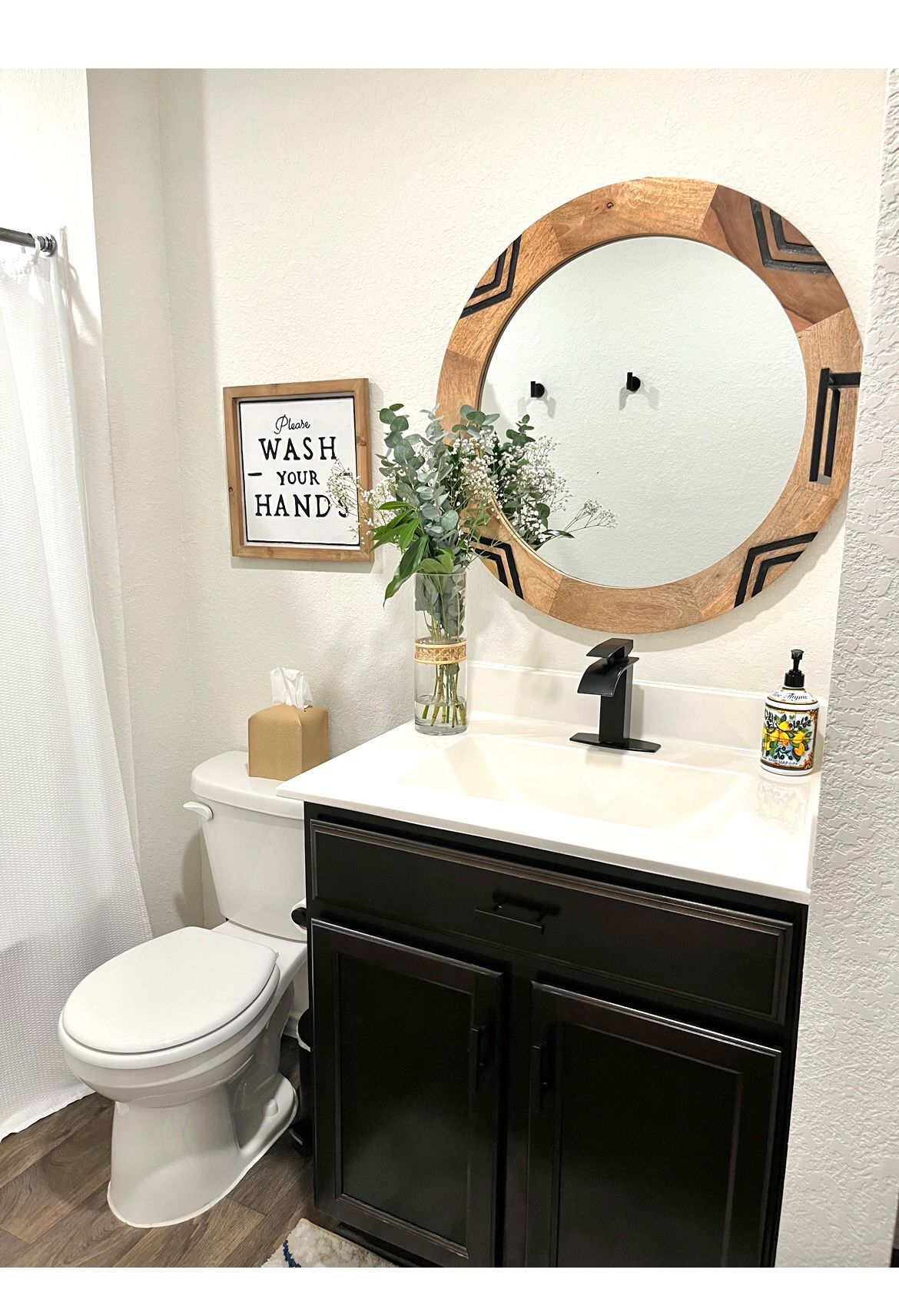 15006 Breccia Road Manor, TX 78653 - Photo 6 of 8 a bathroom with a sink mirror vanity and toilet