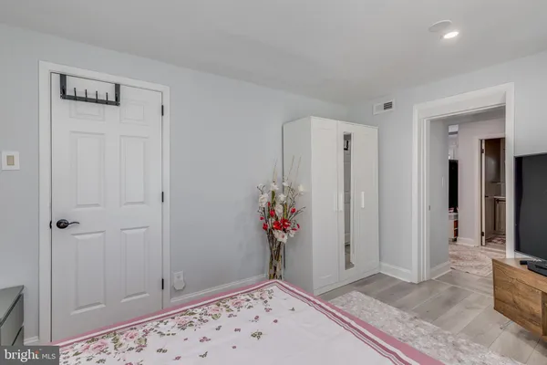 a view of entryway with wooden floor