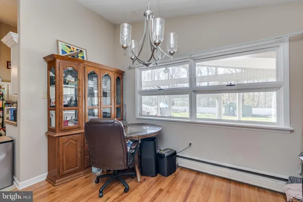 a workspace with wooden floor