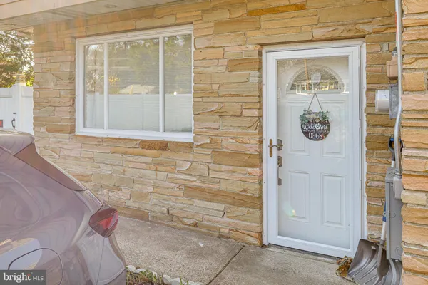 a front view of a house with a door
