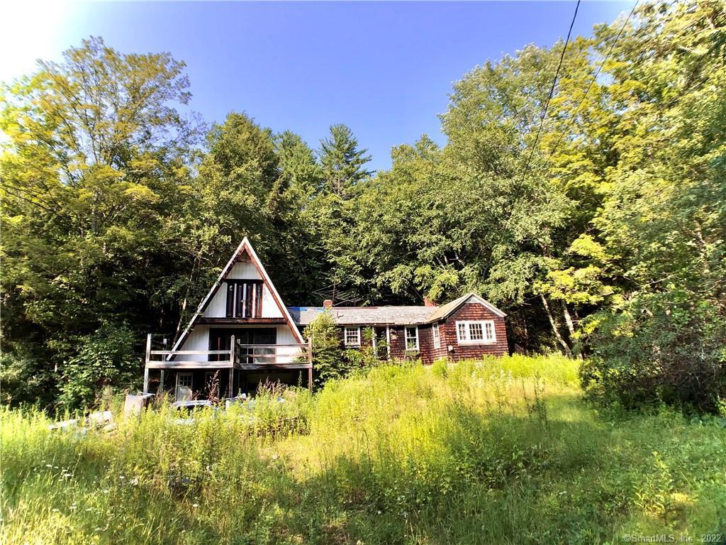 114 Riverton Road Colebrook, CT 06021 - Photo 1 of 1 a front view of a house with a yard