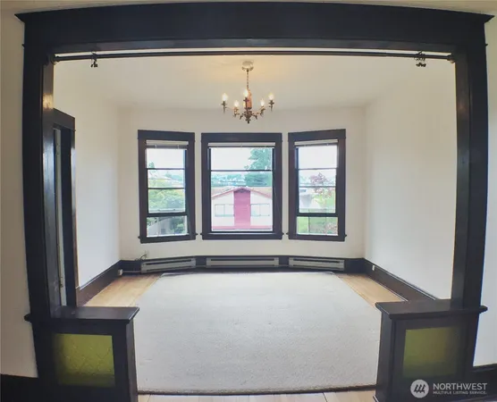 a view of a room with a large window