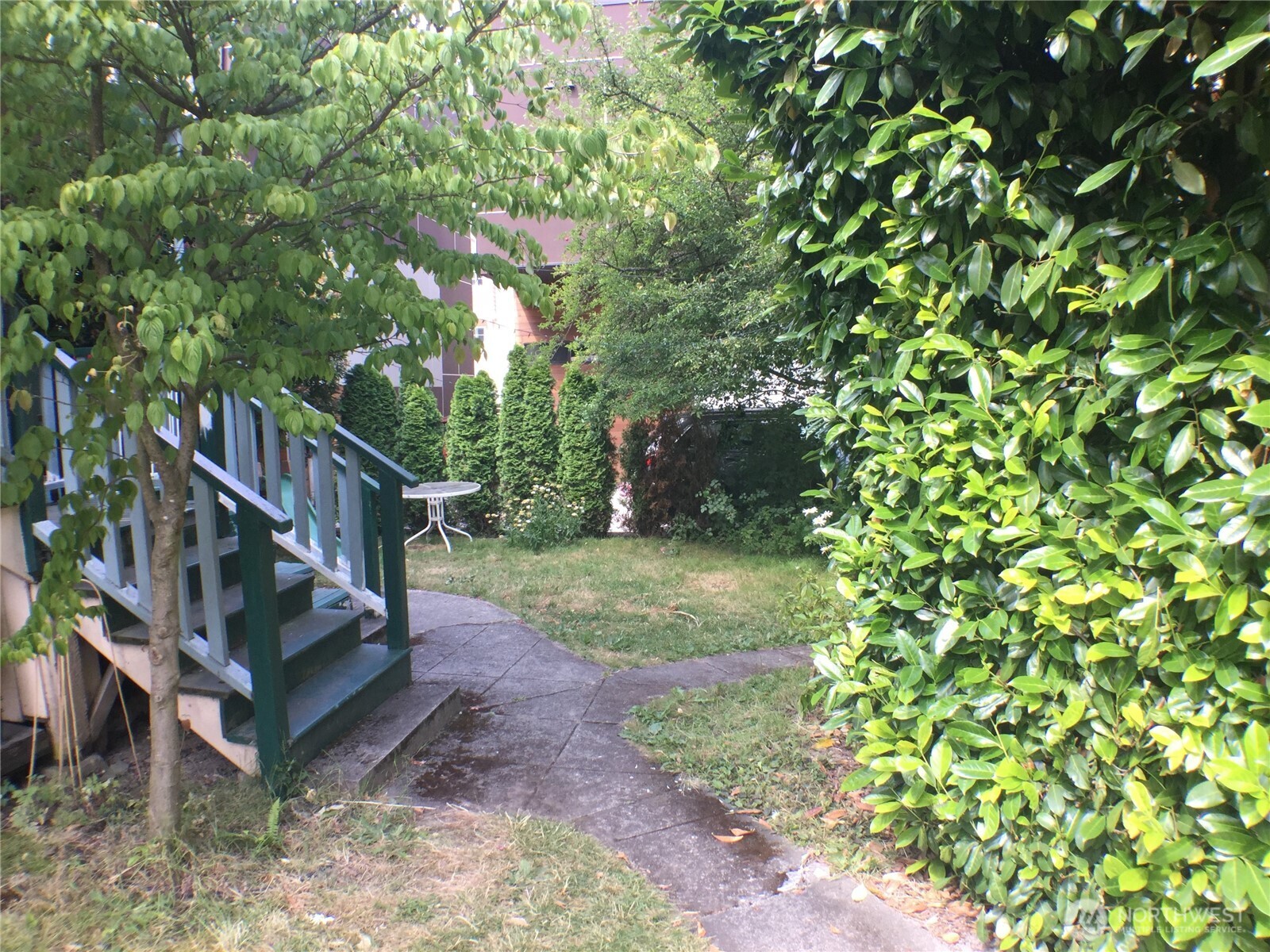 910 Northwest 52nd Street Seattle, WA 98107 - Photo 22 of 22 a view of yard with deck and garden