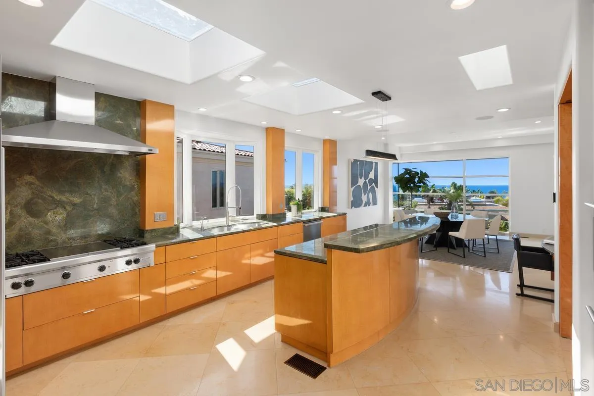 5486 Rutgers Road La Jolla, CA 92037 - Photo 13 of 47 a living room with furniture and a flat screen tv