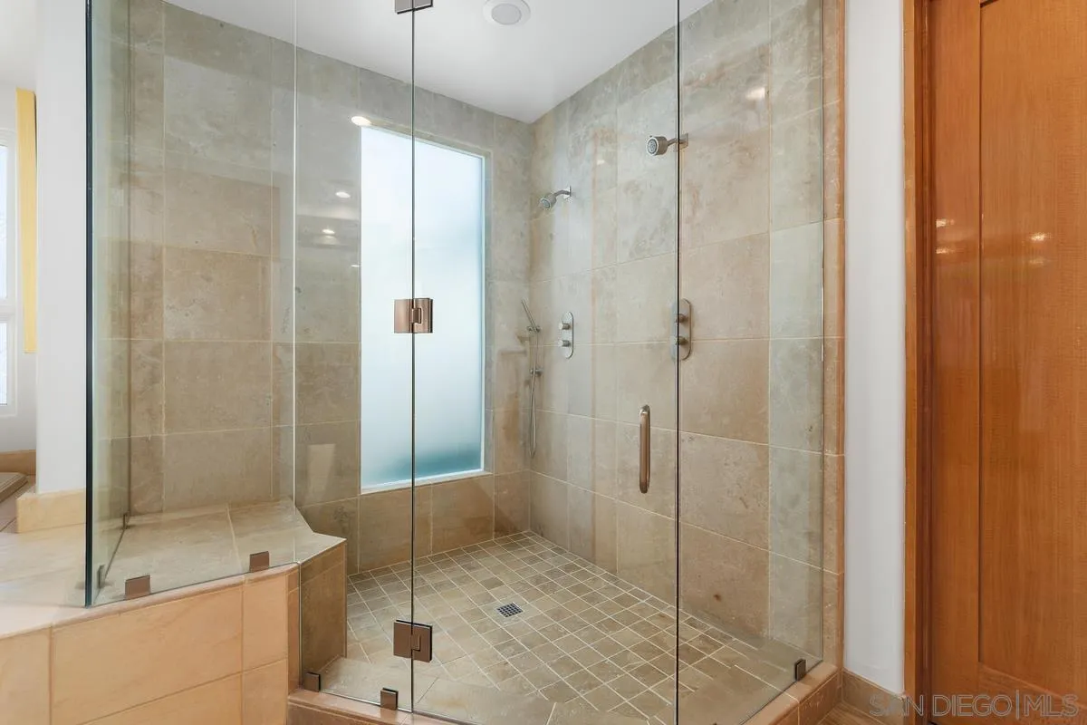 5486 Rutgers Road La Jolla, CA 92037 - Photo 19 of 47 a bathroom with a shower and a sink