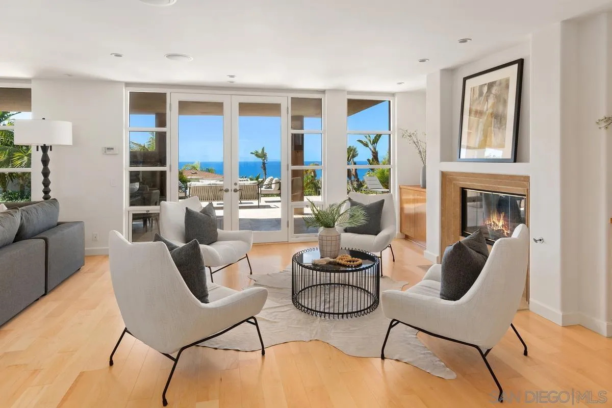 5486 Rutgers Road La Jolla, CA 92037 - Photo 23 of 47 a living room with furniture potted plant and a fireplace