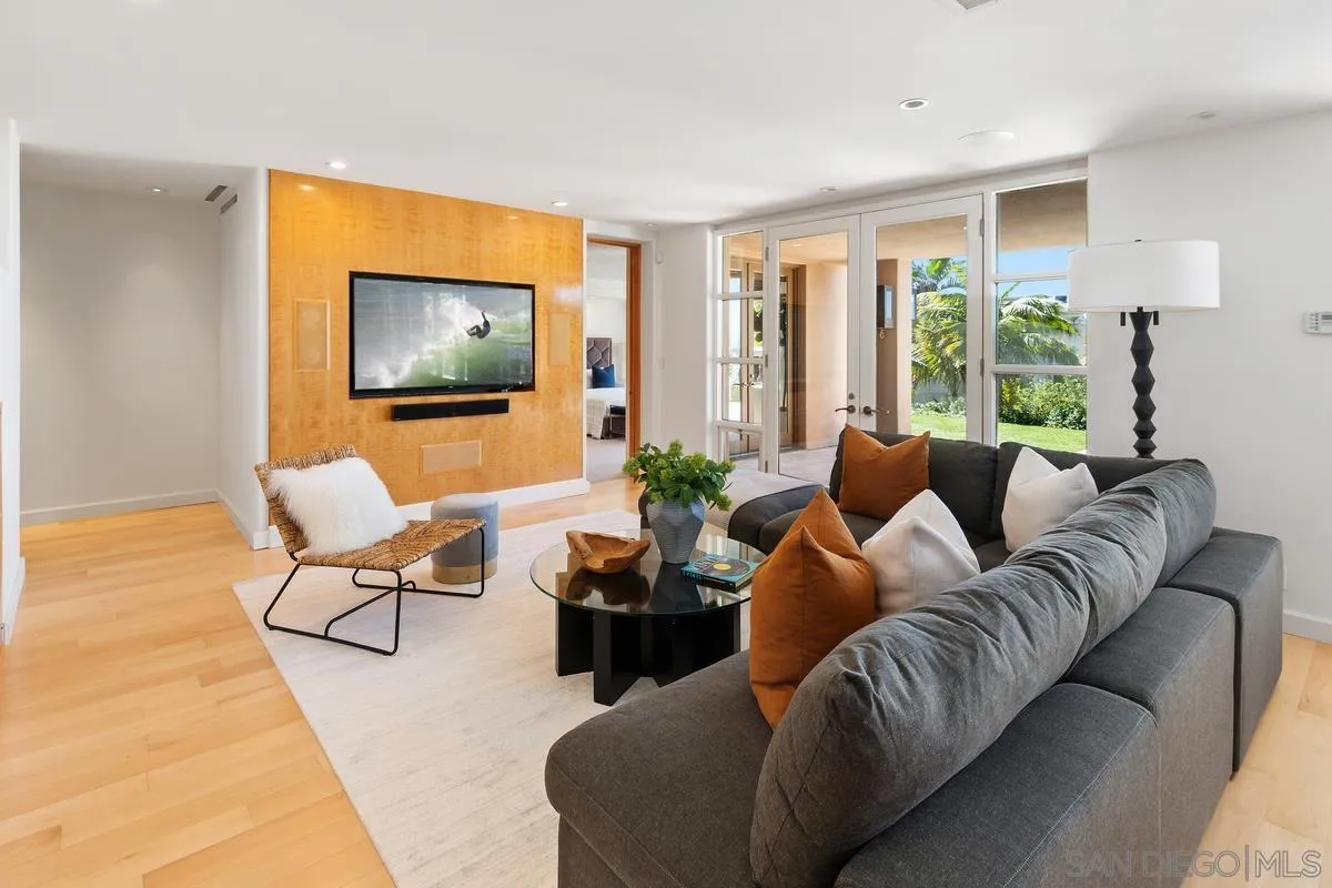 5486 Rutgers Road La Jolla, CA 92037 - Photo 24 of 47 a living room with furniture and a flat screen tv