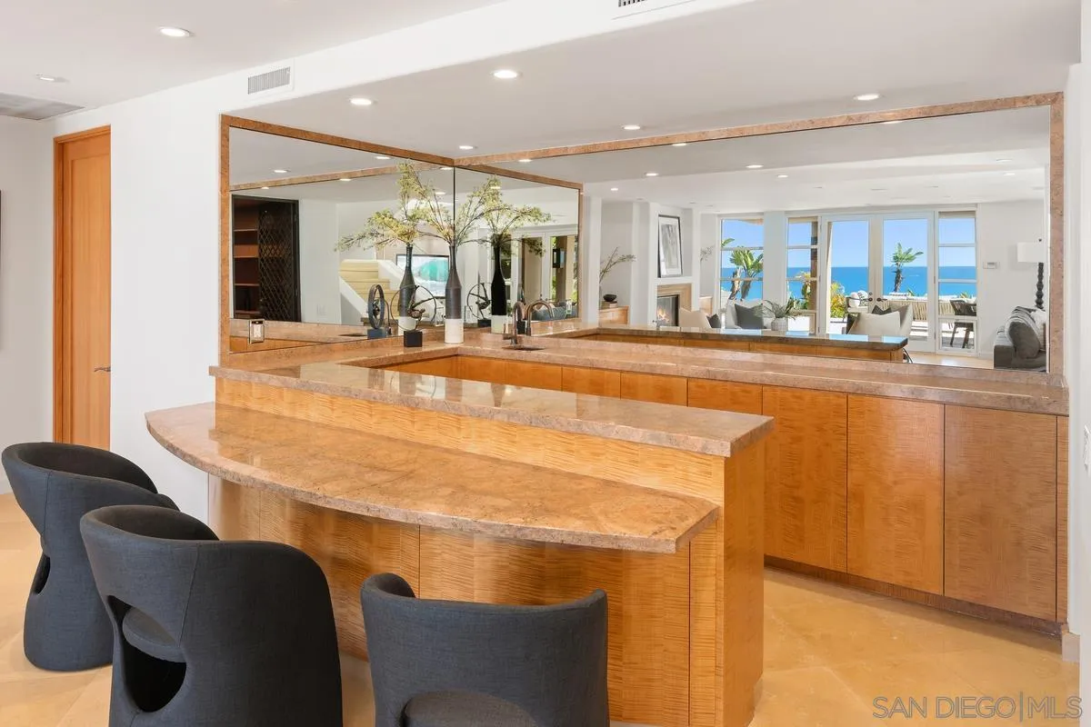 5486 Rutgers Road La Jolla, CA 92037 - Photo 26 of 47 a view of a dining room with furniture and a chandelier