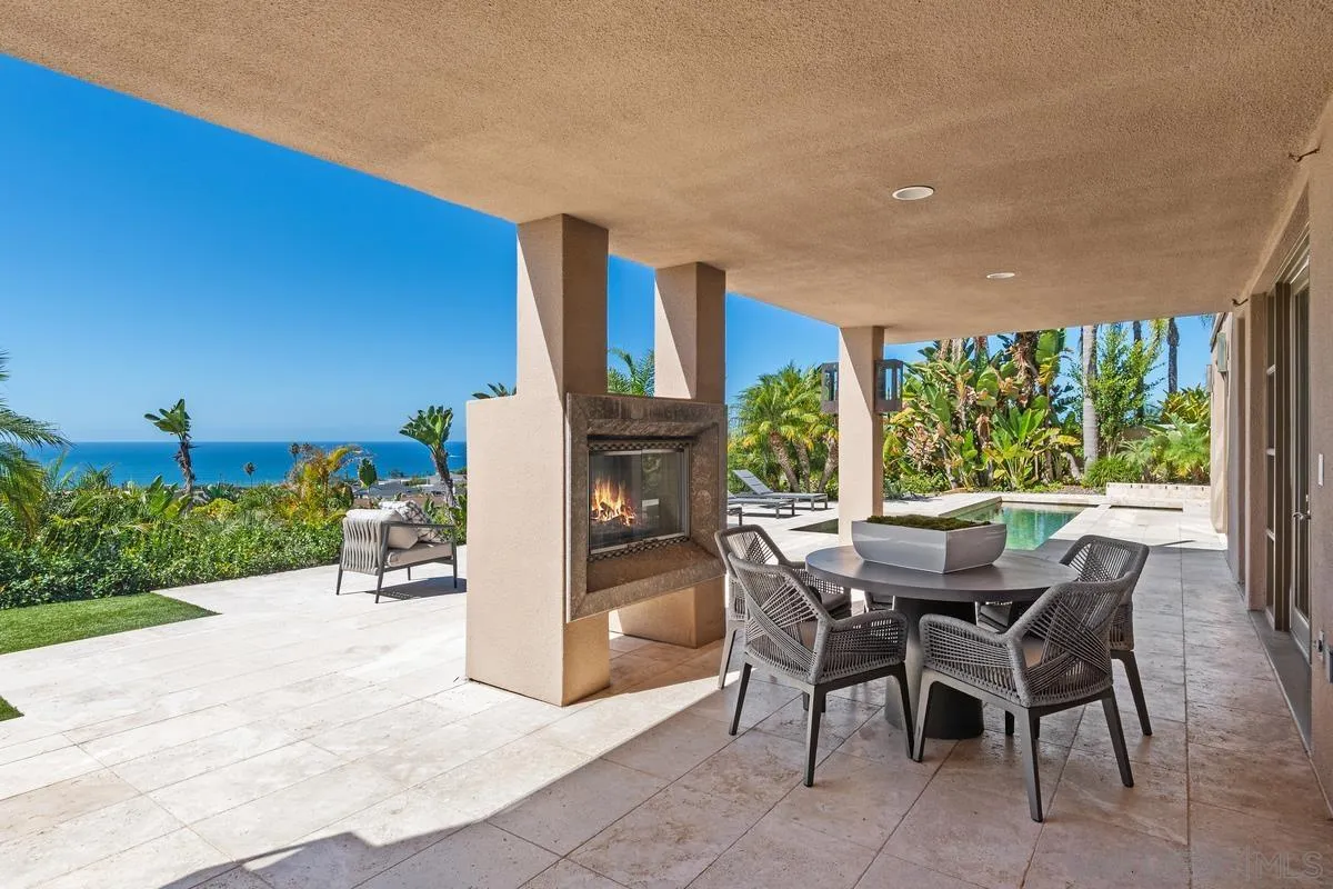 5486 Rutgers Road La Jolla, CA 92037 - Photo 35 of 47 a view of a patio with a table and chairs