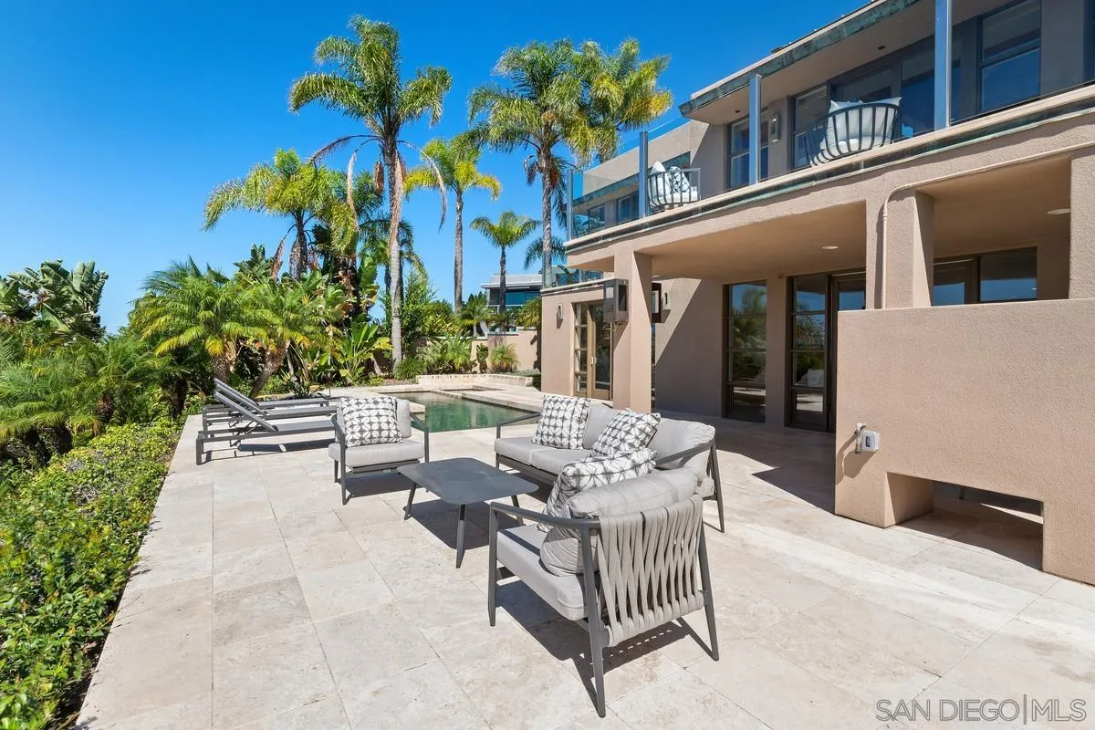 5486 Rutgers Road La Jolla, CA 92037 - Photo 36 of 47 a view of a patio with couches table and chairs and potted plants