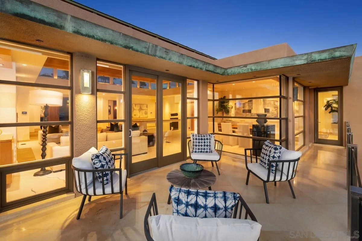 5486 Rutgers Road La Jolla, CA 92037 - Photo 46 of 47 a living room with furniture and floor to ceiling windows