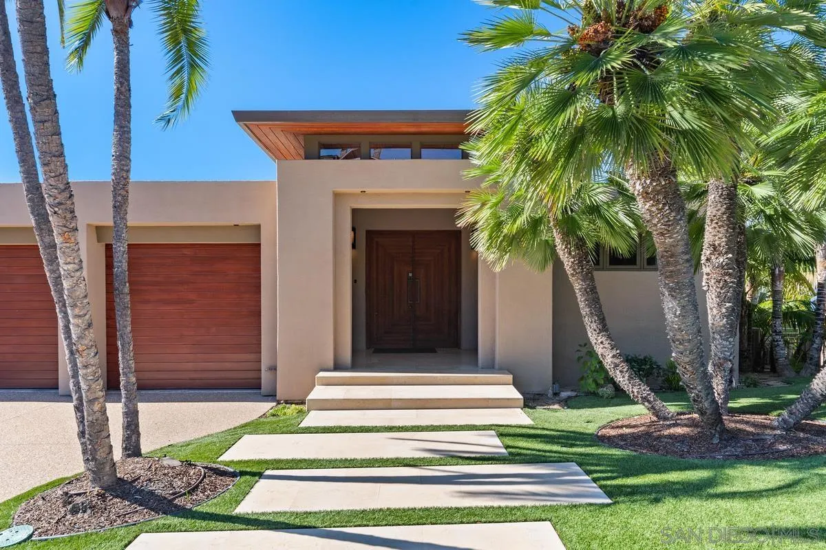 5486 Rutgers Road La Jolla, CA 92037 - Photo 5 of 47 a front view of a house with garden