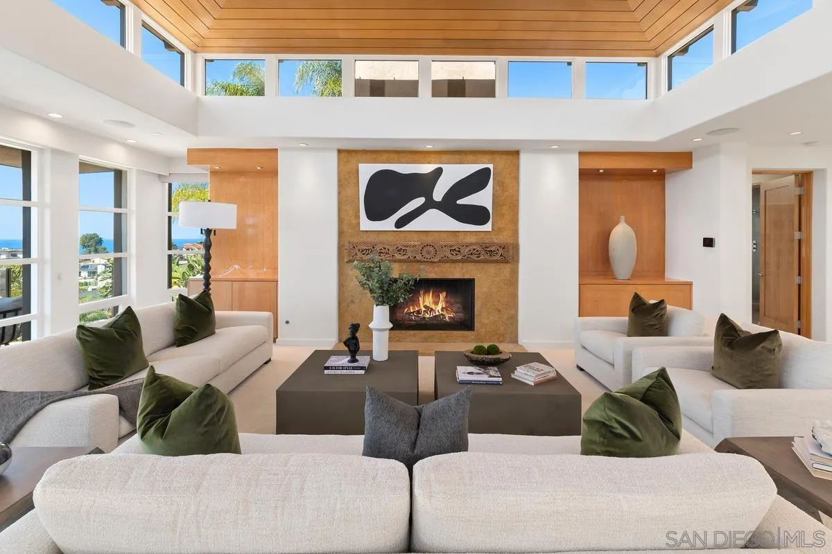 5486 Rutgers Road La Jolla, CA 92037 - Photo 9 of 47 a living room with furniture and a fireplace
